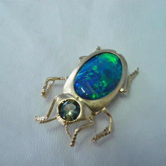 BLACK OPAL AND GREEN SAPPHIRE BEETLE PENDANT